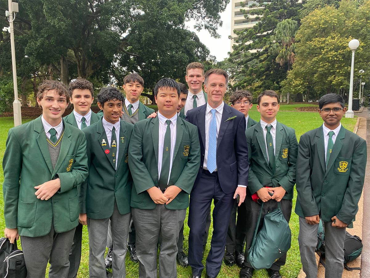 Parramatta Marist Westmead Students with Chris Minns, Premier of NSW. The photo is taken at the ANZAC Memorial in Hyde Park.
