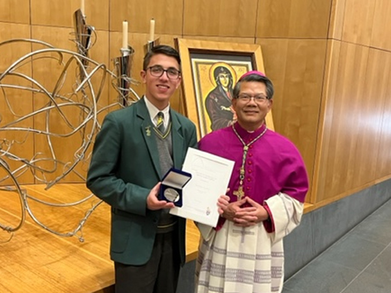 Parramatta Marist High School student Jonathan Roukos receiving Bishop of Parramatta Award