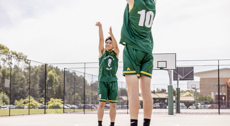 Students playing basketball at Parramatta Marist High School Westmead