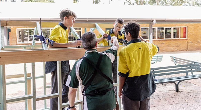 Students working together to work on their building skills at Parramatta Marist High School Westmead