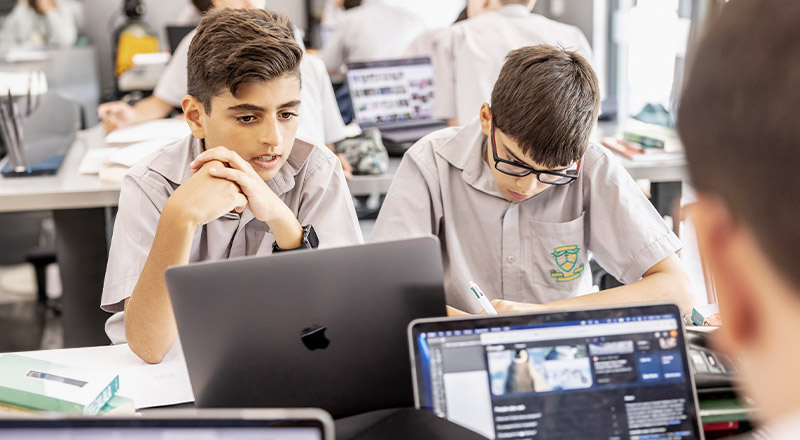 Students working on their laptops in the classroom at Parramatta Marist High School Westmead