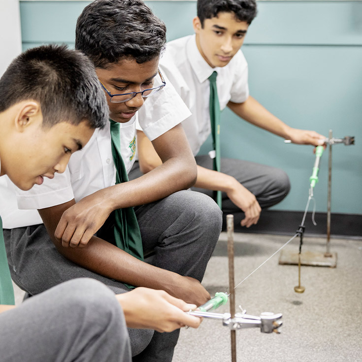 Students experimenting in the science lab at Parramatta Marist High School Westmead